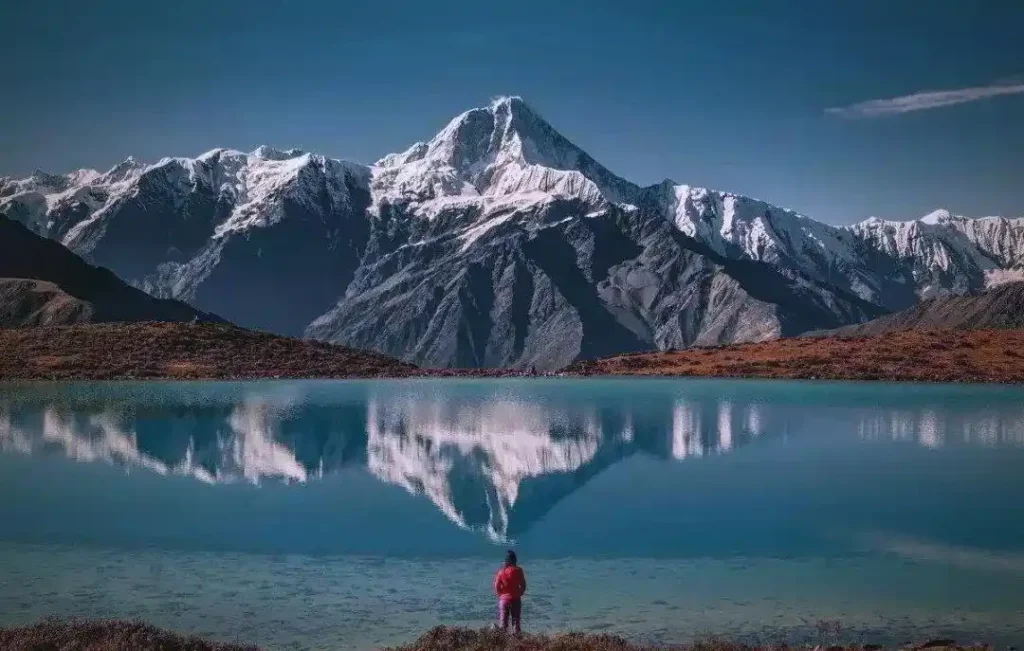 Gongga Mountain alpine lake high altitude trekking scenery